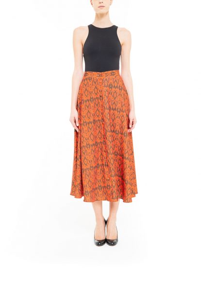 Orange and brown midi ikat skirt with covered buttons