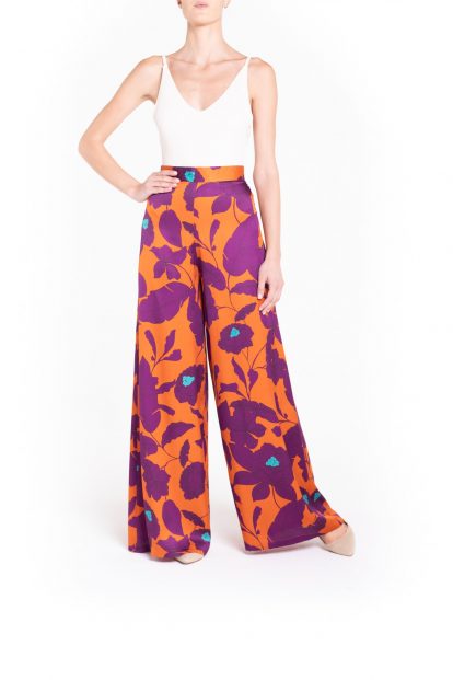 Orange flower fantasy print trousers