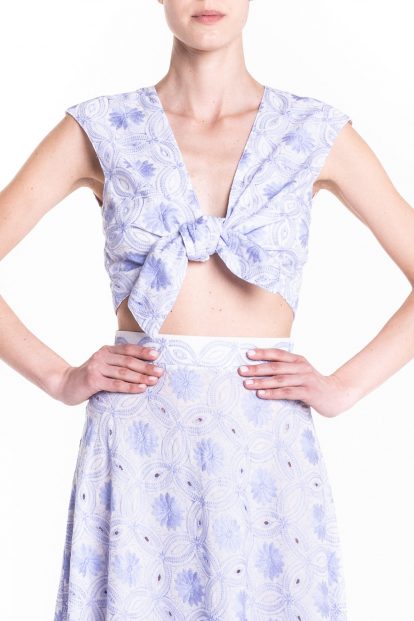 Crossover top with light blue front knot.